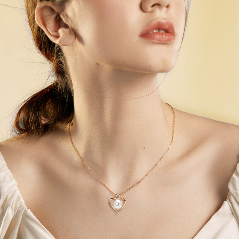 Golden Heart Embrace Pearl Pendant Necklace