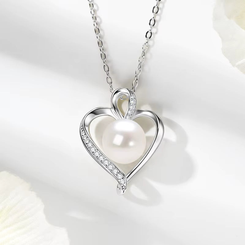 Golden Heart Embrace Pearl Pendant Necklace