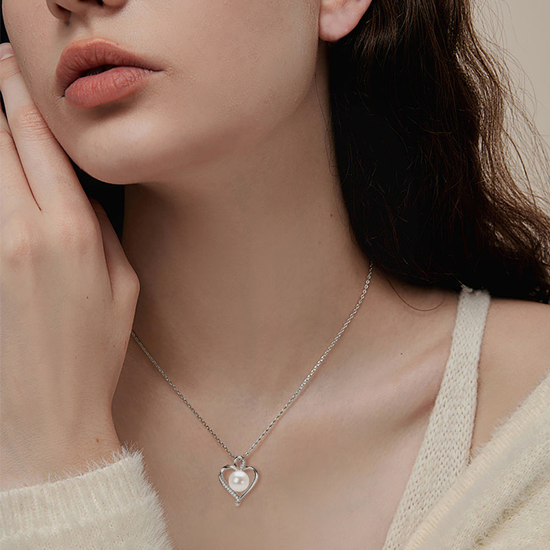 Golden Heart Embrace Pearl Pendant Necklace